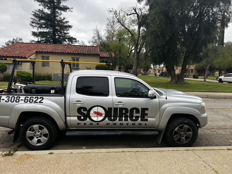 Source Pest Control truck outside a Temecula home